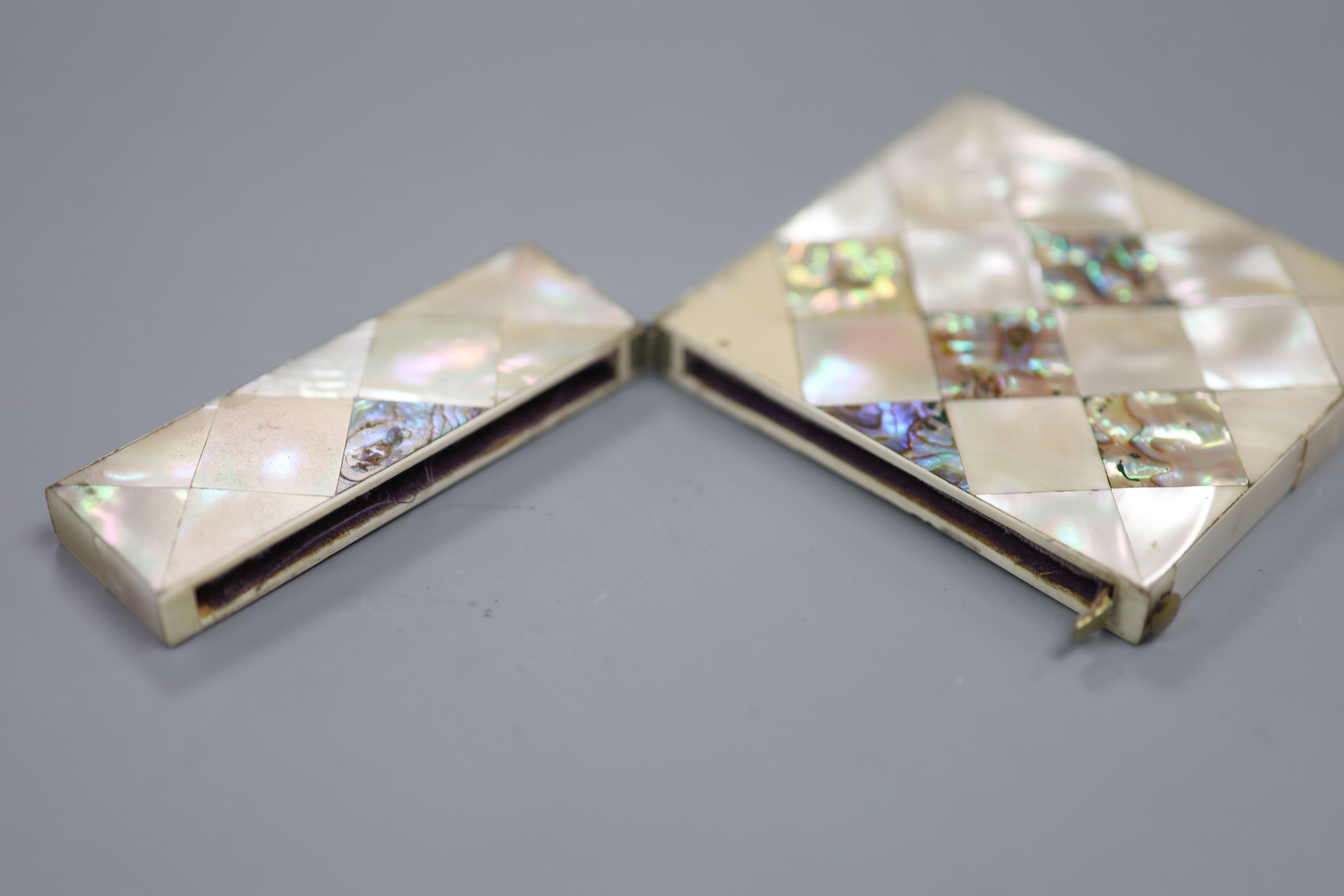 Two Port labels and a mother of pearl card case, height 10cm